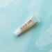 Indie Lee Lip Treat - Gluten-Free Beeswax Balm with Vitamin E for Nourishing & Smoothing Dry Lips | 11 ml - International Shipping Available - Buy Online on GoSupps.com