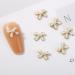 FEIlei 10Pcs 3D Bow Nail Charms Pearl Bowknot Nail Art Decorations Metal Nail Studs
