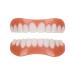 Flipped warm 2 pairs of dentures cosmetic veneers Temporary dentures incorrect teeth false teeth -veneers at the top and floor on dentures on dentures