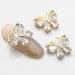 Dornail 5pcs Shiny Zircon 3D Butterfly Nail Charms - Gold Alloy Rhinestone Nail Art Decorations - Buy Online on GoSupps.com