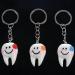 AMIUHOUN 200 Pieces Tooth Shape Keychain Keyring - Perfect Sweet Dental Gift for All Occasions | International Shipping Available - Buy Online on GoSupps.com