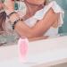 Travel Size Silicone Shampoo Bottle with Brush - Portable Leakage-Proof & Non-Slip Handle - Light Pink | Perfect for On-the-Go Use - Buy Online on GoSupps.com