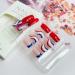 4th of July Patriotic French Tip Fake Nails - Red, Blue, White Swirl Design | 24Pcs Full Cover Coffin Nail Tips for Women - Buy Online on GoSupps.com