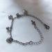 Oralgos Stainless Steel Hero Trailer Bracelet | Enchanting Bell Charm Adjustable Hand Chain | Perfect Jewelry Gift for Women & Men - Buy Online on GoSupps.com