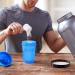 Hiusity Protein Shaker Cup 400ml | Durable Black & White Shaker with Mixing Ball for Creamy Fitness Shakes | Odor-Neutral Gym Shaker - Buy Online on GoSupps.com