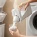 dijiusidy Washing Powder Fluid Container Sealed Tilted Mouth Refillable Lifting Handle Home Toilet Case with Measuring Cup 1100ml - Buy Online on GoSupps.com