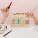 Chenille Letter Nylon Waterproof Makeup Bag for Women - Beige-Skin Travel Organizer Pouch for Toiletries and Cosmetics - Buy Online on GoSupps.com