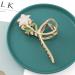 Gold Lily Flower Metal Hair Claw Clip for Thick, Thin, Curly Hair - Fashion Hair Accessory for Women and Girls - Buy Online on GoSupps.com
