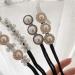 4PCS Women Magic Hair Bun Maker with Pearl and Flower - Hair Styling Tool - Buy Online on GoSupps.com