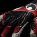 uhlsport Unisex Youth Powerline Supergrip+ HN Football Goalkeeper Gloves 9.5 | Black/Red/White - Buy Internationally - Buy Online on GoSupps.com