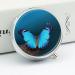 Beautiful Blue Butterfly Round Pill Box - 3 Compartment Portable Organizer - Decorative Metal Case for Medicine - Ideal Travel Pill Container - Buy Online on GoSupps.com