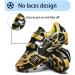 Riawexen Boys & Girls Football Boots - Non-Slip Soccer Training Shoes (28-37 EU) - Unisex Low Top Black/Yellow - Buy Online on GoSupps.com