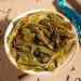 Raw Pu-Erh Teecake Green Tea 357g - Authentic Yunnan Menghai Puer Tea | Healthy Chinese Pu'er Tea - Buy Online on GoSupps.com