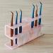 LIXIMMAZN 8-Hole Acrylic Tweezers Holder | Eyelash Extension Tools Rack & Stand | Durable Salon Supplies Display (Marbled Pink) - Buy Online on GoSupps.com