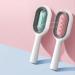 4-in-1 Animal Hair Removal Comb & Cat Brush with Water Tank - Multifunctional Pet Cleaning Tool for Massage & Care in Blue - Buy Online on GoSupps.com
