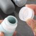 Gemice Silicone Travel Bottle 4 Pack Portable Travel Containers Set LeakProof Refillable Squeezable for Lotion Liquid Shampoos Soap and Toiletries (90ml) Grey - Buy Online on GoSupps.com
