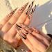 Justotry 24 pieces swirl stiletto nails to stick on black French french artificial nails leopard almond art nails press on nails pretty fingernails fake nails for women black & stiletto2