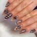 Justotry 24 pieces swirl almond nails to stick on with animal patterns black French press on nails oval artificial nails fake nails fingernails artificial nails for women black & oval1