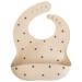 Mushie Baby Silicone Bib | Adjustable Fit Waterproof Bibs | Easy Wipe Baby Feeding Bibs | 4 Adjustable Sizes with Deep Front Pockets | 100% BPA and Phthalate Free Black Daisy