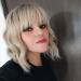 KEVVTY Ombre Blonde Wavy Bob Wig 14 Inch with Bangs - Realistic Medium Length Synthetic Cosplay Wig for Women - Buy Online on GoSupps.com
