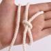 XKDOUS 4mm x 150Yards Natural Cotton Macrame Cord - 3 Strand Twisted Rope for Wall Hanging, Plant Hangers, Crafts & Knitting - Soft Undyed Cotton Rope for Decorative Projects - Buy Online on GoSupps.com