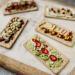 Nairn's Gluten Free Caramelised Onion Flatbreads 150 g - Buy Online on GoSupps.com