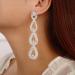 Denifery Rhinestones Chandelier Tassel Drop Earrings Statement Teardrop Crystal Stud Earrings for Wedding Bling Bridal Earrings Dangling for Women and Girls (Silver)