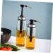 WOFASHPURET Glass Containers for Liquids Coffee Syrup Dispenser Pump Stainless Steel Press Mouth 22.5x6x6cm Black - Buy Online on GoSupps.com