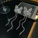 Xerling Rhinestone Butterfly Tassel Earrings - Bling Crystal Chain Studs for Women | Statement Bridal & Prom Jewelry - Buy Online on GoSupps.com