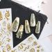 Songjie 4 Sheets Gold Nail Stickers: Bronzing Rose, Snake Eyes, Heart 3D Self-Adhesive Decorations - Perfect for Fake Nail Designs and Salon Accessories - Buy Online on GoSupps.com