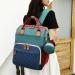 Fexkean Large Capacity Baby Diaper Bag Backpack - Portable Travel Diaper Bag with Foldable Bed & Multi-Functionality - Ideal for Parents on the Go - Buy Online on GoSupps.com