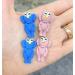 KAWS Nail Charms 4pcs - Mixed Green Pink | Add a touch of art to your nails - Buy Online on GoSupps.com