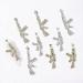 3D Gun Nail Charms 22PCS - Gold, Silver, Pink Alloy Rabbit Rhinestone Nail Art Decorations - Buy Online on GoSupps.com