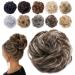 Tess hair part dutt brown mix hair tie with hair wavy thick hair knot updos.