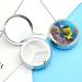 Round Tropical Fish Print Pill Box | 3 Compartment Portable Medicine Organizer - Stylish Metal Design - Buy Online on GoSupps.com