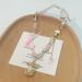 Shop Oralgo's Stylish Pearl Necklace with Art Beads & Adjustable Loop Pendant - Perfect Collarbone Chain for Every Occasion - Buy Online on GoSupps.com