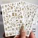 Songjie 4 Sheets Gold Nail Stickers: Bronzing Rose, Snake Eyes, Heart 3D Self-Adhesive Decorations - Perfect for Fake Nail Designs and Salon Accessories - Buy Online on GoSupps.com