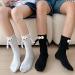MUTYNE Magnetic Hand Holding Socks - Women Men Couple Socks (Black) | Funny 3D Doll Design | One Size Fits All - Buy Online on GoSupps.com