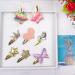 Shop 16-Pack Glittering Hair Clips for Girls | Star Heart & Butterfly Designs | Snappy Clamping Accessories - Buy Online on GoSupps.com