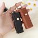 TIESOME 2 Pcs Lipstick Keychain Holder | Portable Soft Leather Chapstick Case in Black & Brown | Perfect Travel Accessory - Buy Online on GoSupps.com