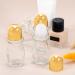 3Pcs Gold Glass Roller Bottles 50ml - Refillable & Leak-Proof for Essential Oils Perfume & Cosmetics - Buy Online on GoSupps.com