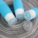 Cosogreen Silicone Travel Bottles 3 Pack - Portable Squeeze Bottles for Lotion, Shampoo, Bath - Blue - Buy Online on GoSupps.com