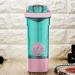 Artoid Mode 24-Ounce Fitness Protein Shaker Bottle | Dual Mixing Technology with Shaker Balls & Grids | Twist & Lock Protein Box | Cream Pink/Aqua Green - Buy Online on GoSupps.com
