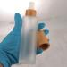 Cosidea 100ml Bamboo Lid Milk Glass Spray Bottles - Set of 4 | Perfect for Perfume Toners & Toiletries | Fine Mist Spray Pumps - Buy Online on GoSupps.com