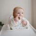Mushie Baby Silicone Bib | Waterproof Easy Wipe Feeding Bibs with Adjustable Fit and Deep Pockets | BPA-Free White Letters - Buy Online on GoSupps.com