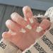 WOOXDYUK Nail Art Set Press On Nails Medium French Tip French Style Chain Nails Pack of 24 False Nails With imported jelly glue +1 nail Rub +1 Alcohol Pack +1 Nail Remover D012