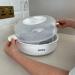 Nuby Microwave Baby Bottle Steriliser - 4 Min Cycle | Keeps Contents Sterile 24hrs | Kills 99.9% of Germs - White - Buy Online on GoSupps.com