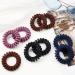 Zouiqss Spiral Hair Ties - Strong Hold Ponytail Holders | 12 Black Waterproof Hair Gums for All Hair Types - Buy Online on GoSupps.com