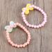 Upkoch 12-Pack Colorful Arm Loop Baby Girl Bracelets - Candy-Colored Party Jewelry & Cartoon Toys for Kids - Buy Online on GoSupps.com