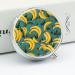 Round Pill Box with Yellow Banana Print | 3 Compartment Decorative Metal Pill Organizer | Portable Pocket Pill Case for Medicine - Buy Online on GoSupps.com